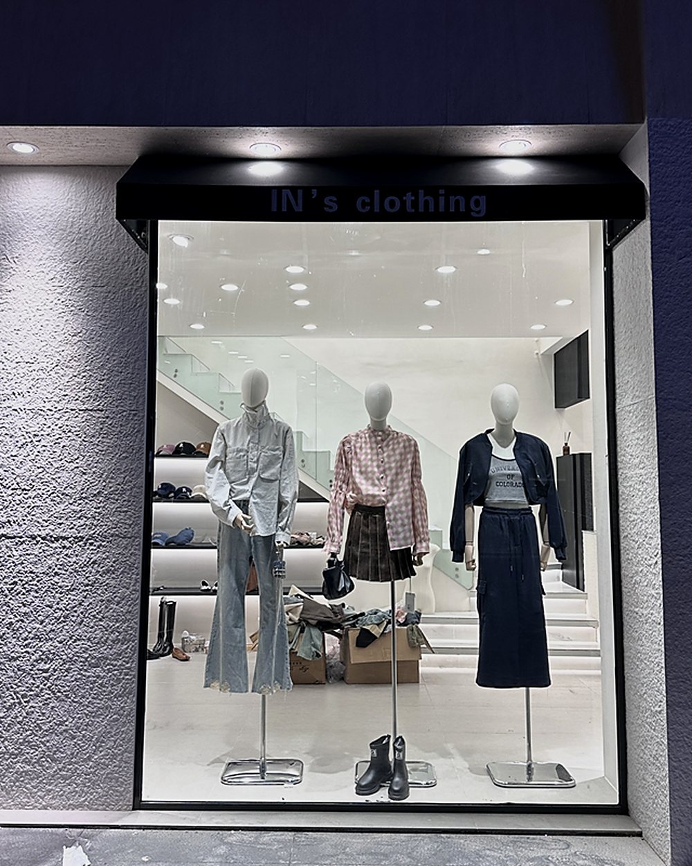 Retail storefront with textured MCM surround